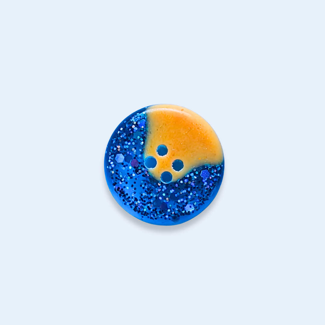 Knappar 15 mm [brandgult i blått glitter, 7 st]