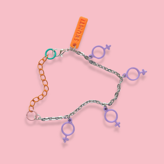 Armband [lila kvinnotecken]