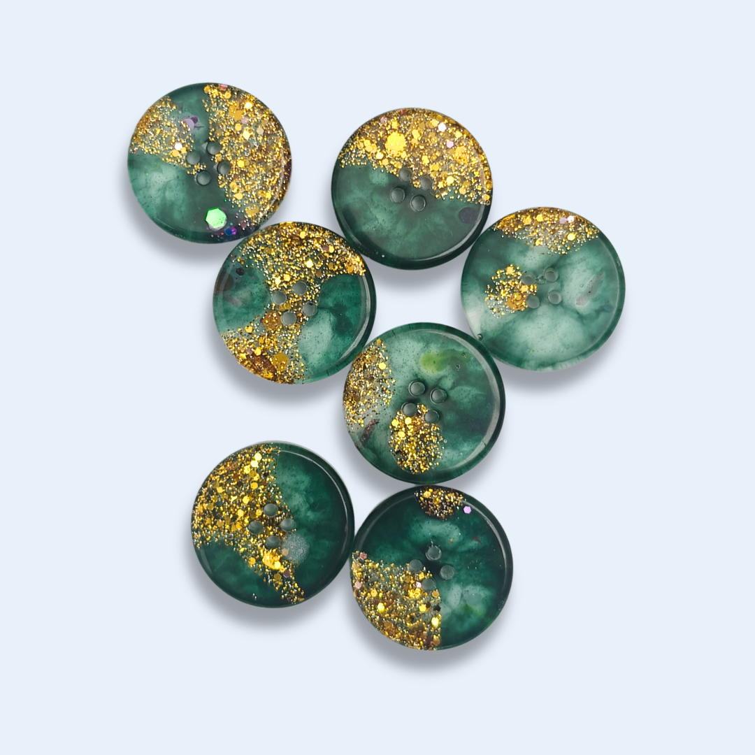 Knappar 25 mm [guld i grön dimma, styckvis]